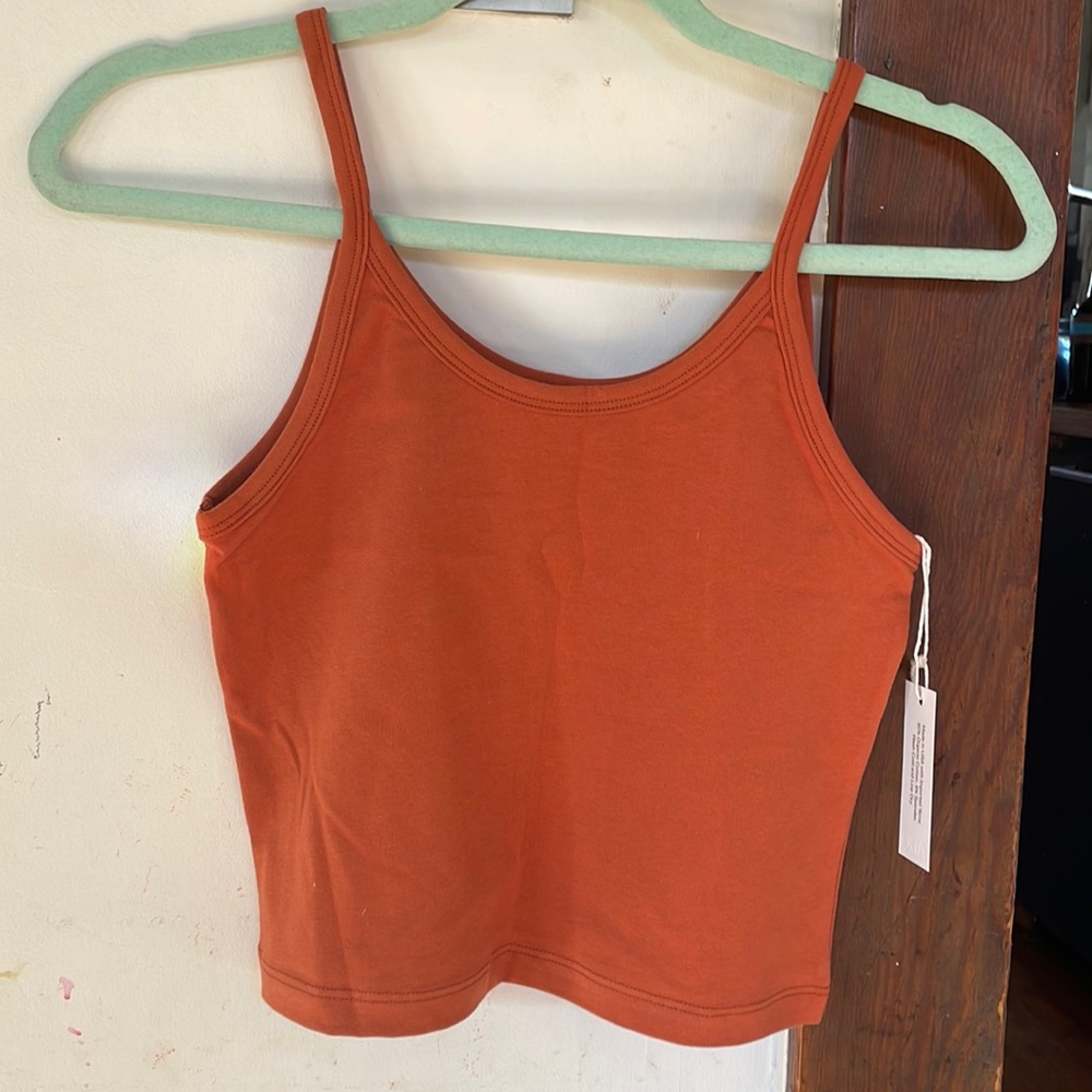 ARQ crop tank. Color rust. Size medium. New with tags